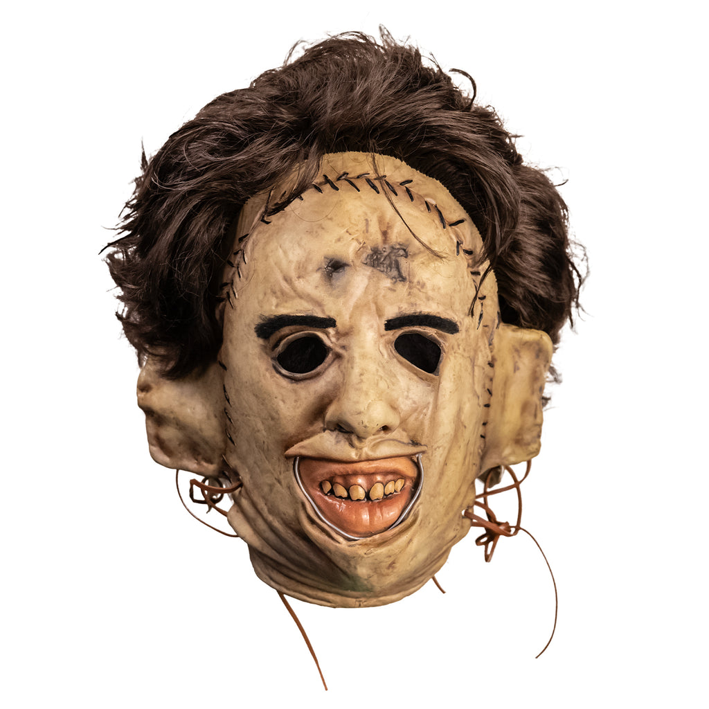Leatherface latex mask with hair and leather thread details, front view