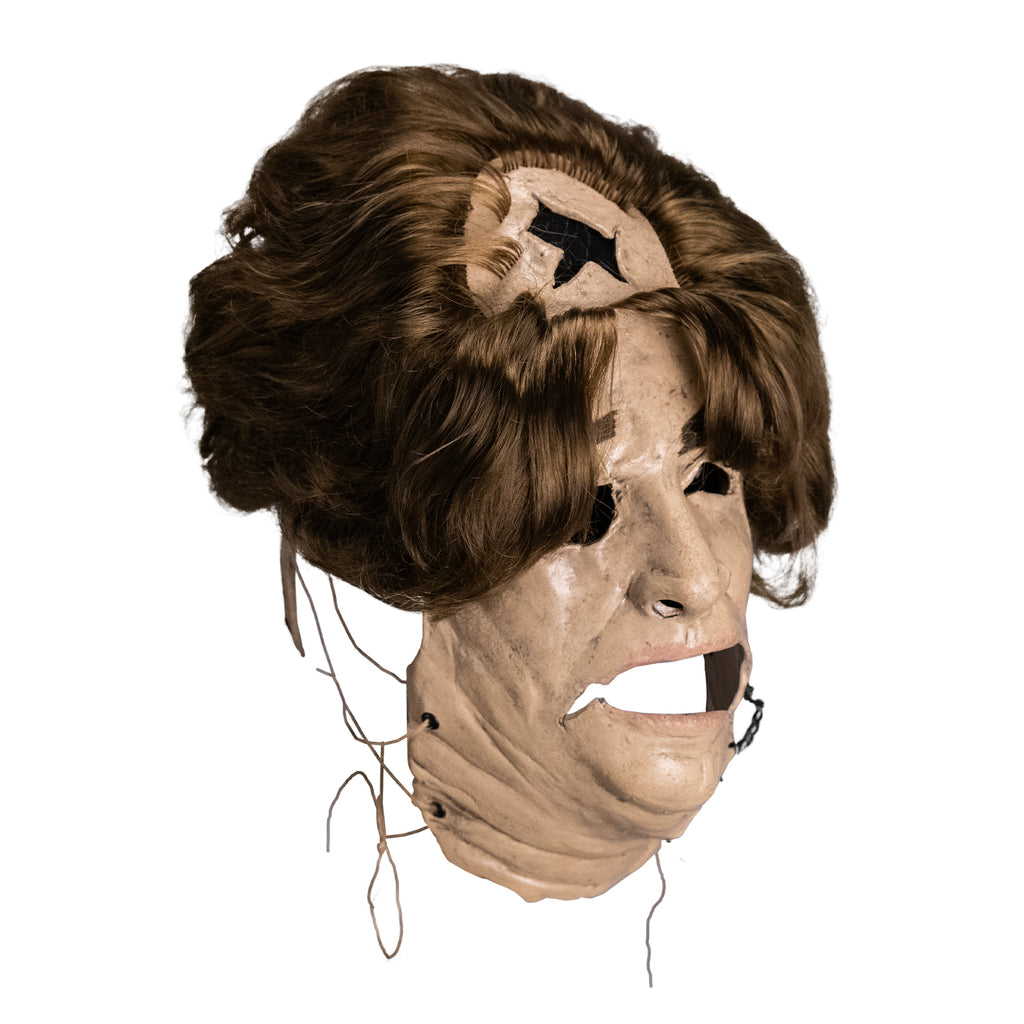 Leatherface latex mask with hole in head and hair and leather string details, side view