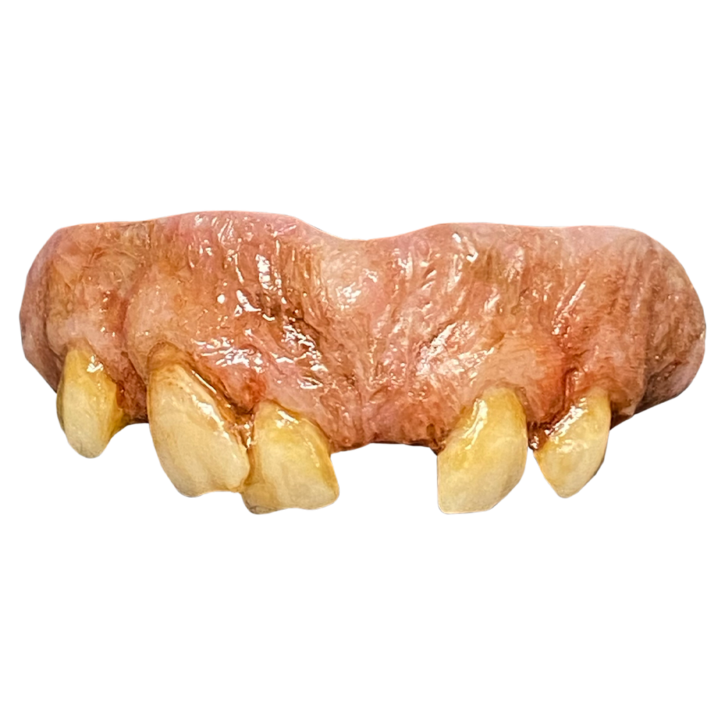 costume teeth.  upper set only.  yellow, misshapen gapped teeth, set in pale pink and brown gums