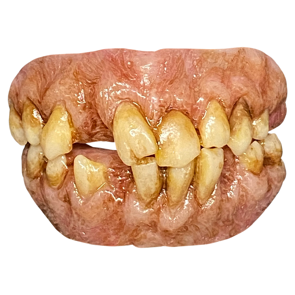 costume teeth.  upper and lower sets.  yellow, misshapen gapped teeth, set in pale pink and brown gums