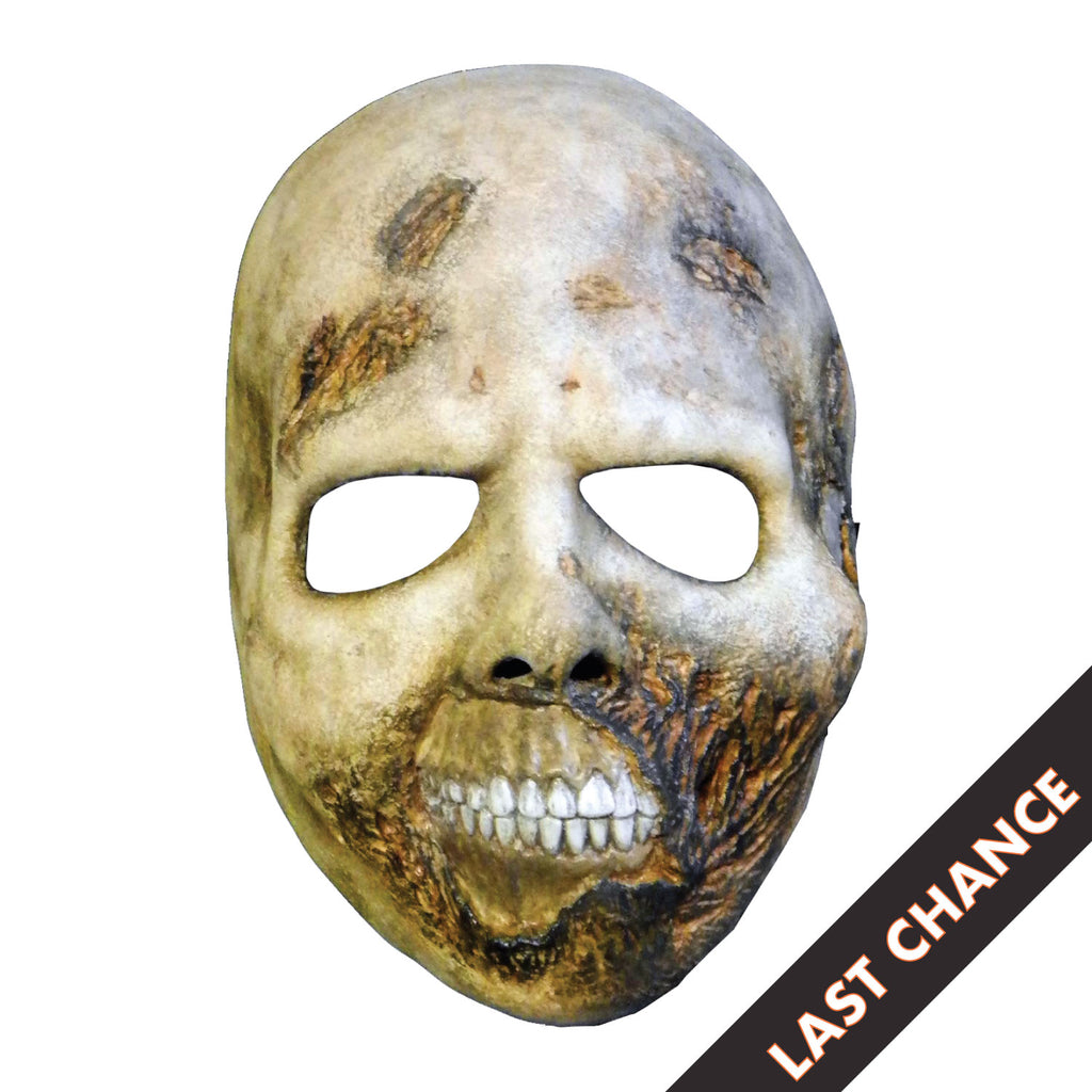 white background, black diagonal banner, bottom right corner, white text reads last chance. Zombie Face mask. Rotting flesh, white, brown and black. Black eye sockets. Exposed bone and teeth around mouth.