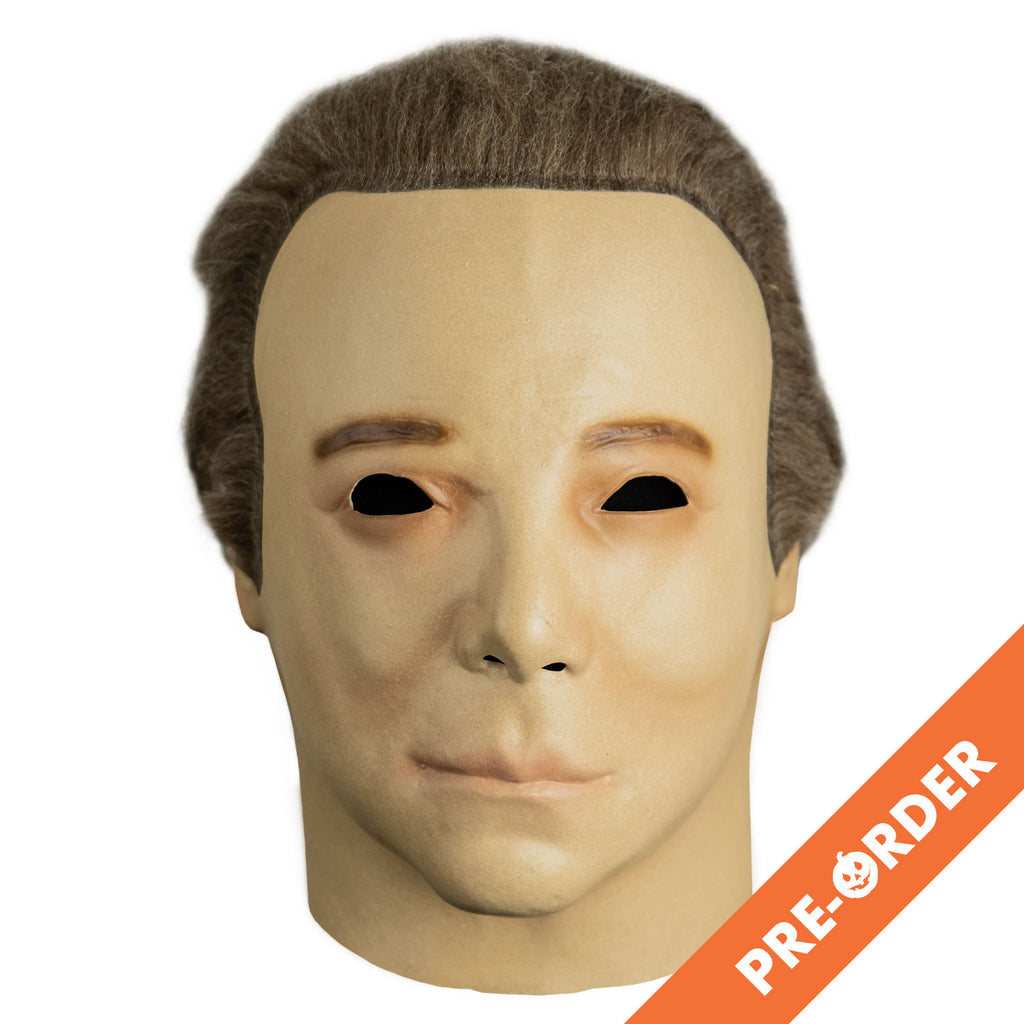 white background, orange diagonal banner bottom right, white text reads pre-orderMask, front view, head and neck.  short light brown hair, brown eyebrows.