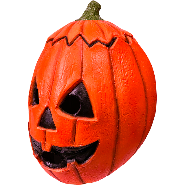 Pumpkin with carved face on a white background
