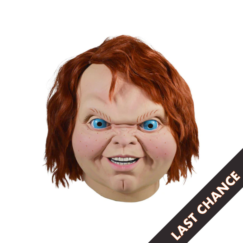 white background, black diagonal banner, bottom right corner, white text reads last chance.  Front view. Evil Chucky Mask. Head and neck. Red Hair blue eyes, freckles, cleft chin, sneering face.