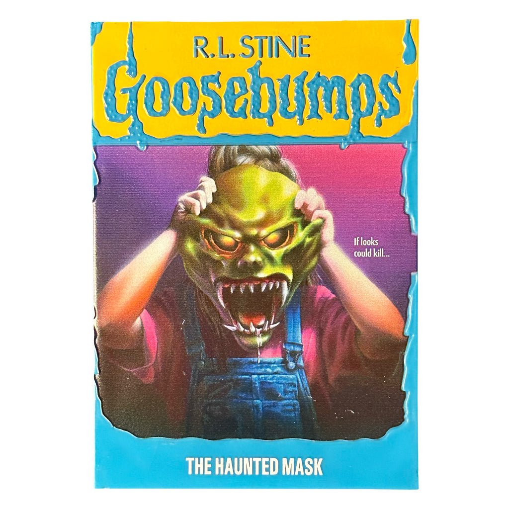 Magnet. Has the appearance of a book cover. Illustration of a child in blue overalls with a monster mask over their face, purple background. Yellow banner at top, blue text reads R.L. Stine, Goosebumps. White text on illustration reads, If looks could kill. Blue border at bottom, white text reads The Haunted mask. 