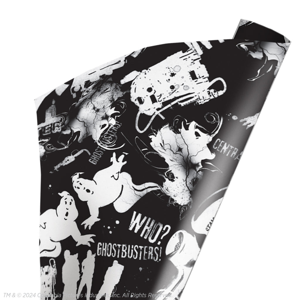wrapping paper. Black and white repeating pattern of movie characters and images.