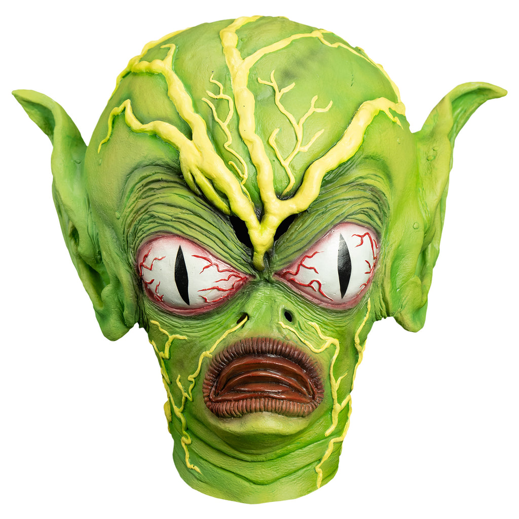 Mask, front view.  Bright green flesh. yellow green veins large on forehead and top of enlarged head, smaller yellow veins on forehead cheeks and neck.  Very large pointed ears.  Very large bloodshot white eyes with vertical black pupils. wrinkled skin around eyes.  two holes for nostrils.  small chin.  red frowning mouth 