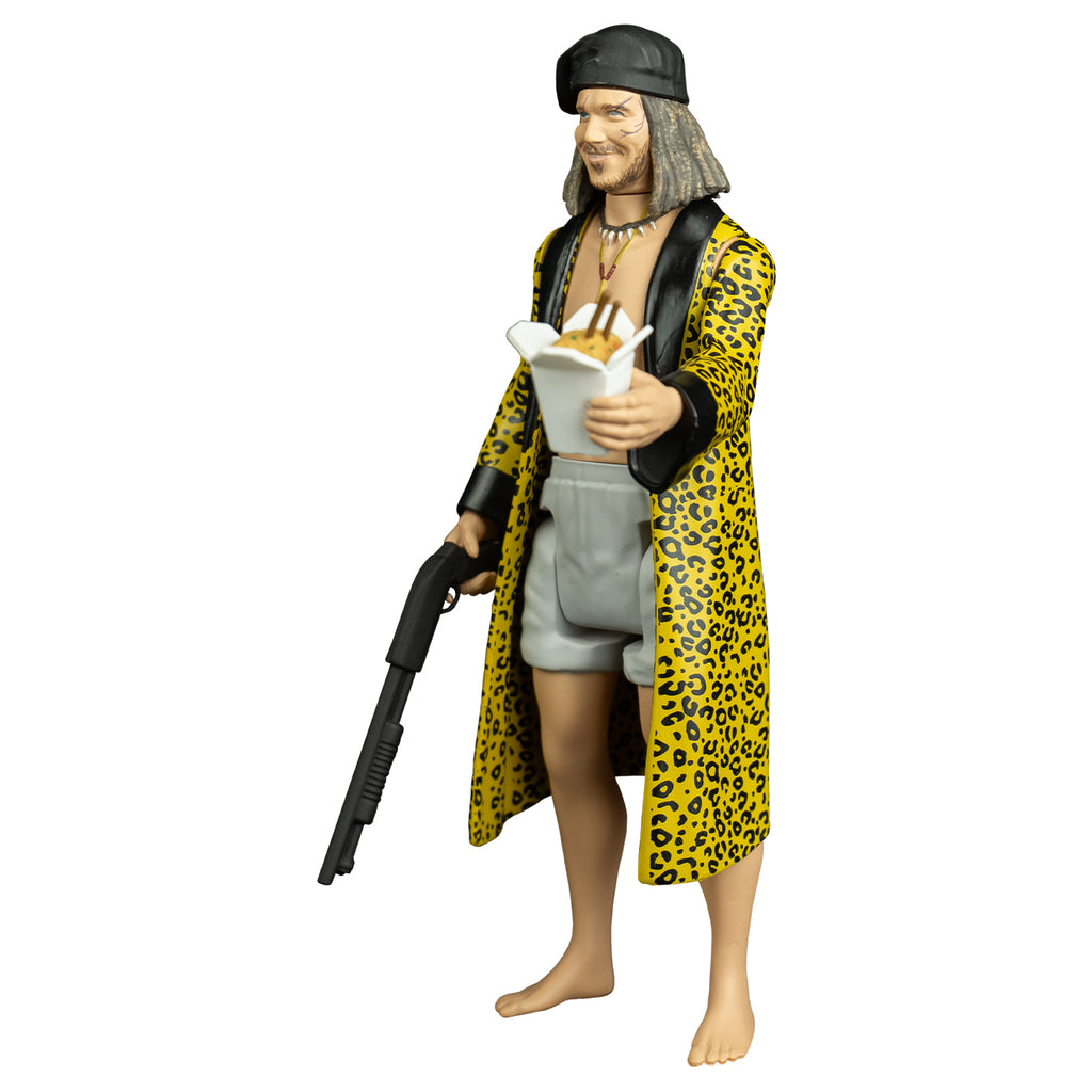 Drexel figure, left view. Man, scars on face, shoulder length brown hair, black bandana on head, thin mustache and beard with soul patch, wearing two necklaces, white boxer shorts, yellow cheetah print robe with black trim, no shirt or shoes.  Chinese food takeout box with food and chopsticks inside, in left hand, shotgun in right hand.