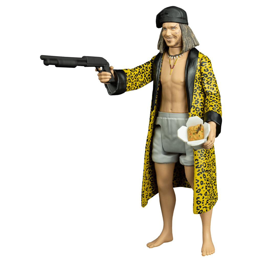 Drexel figure, left view. Man, scars on face, shoulder length brown hair, black bandana on head, thin mustache and beard with soul patch, wearing two necklaces, white boxer shorts, yellow cheetah print robe with black trim, no shirt or shoes.  Chinese food takeout box with food and chopsticks inside, in left hand, shotgun in raised right hand.