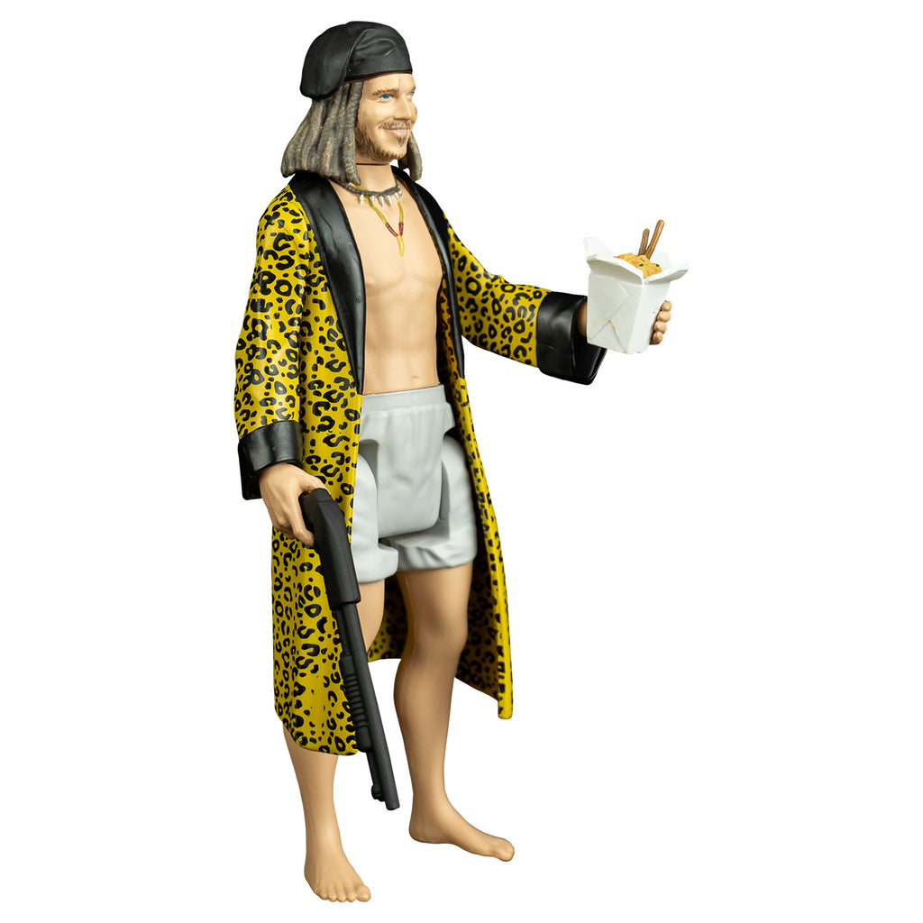 Drexel figure, right view. Man, scars on face, shoulder length brown hair, black bandana on head, thin mustache and beard with soul patch, wearing two necklaces, white boxer shorts, yellow cheetah print robe with black trim, no shirt or shoes.  Chinese food takeout box with food and chopsticks inside, in left hand, shotgun in right hand.