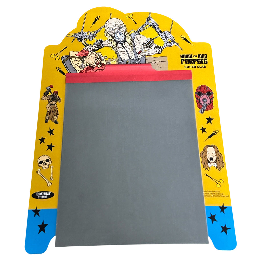 reusable doodle pad. blue, red and yellow with illustrations of movie characters. Black text reads House of 1000 Corpses, super slab, manufacturing and licensing information. Black oval with white text reads Trick or Treat Studios.