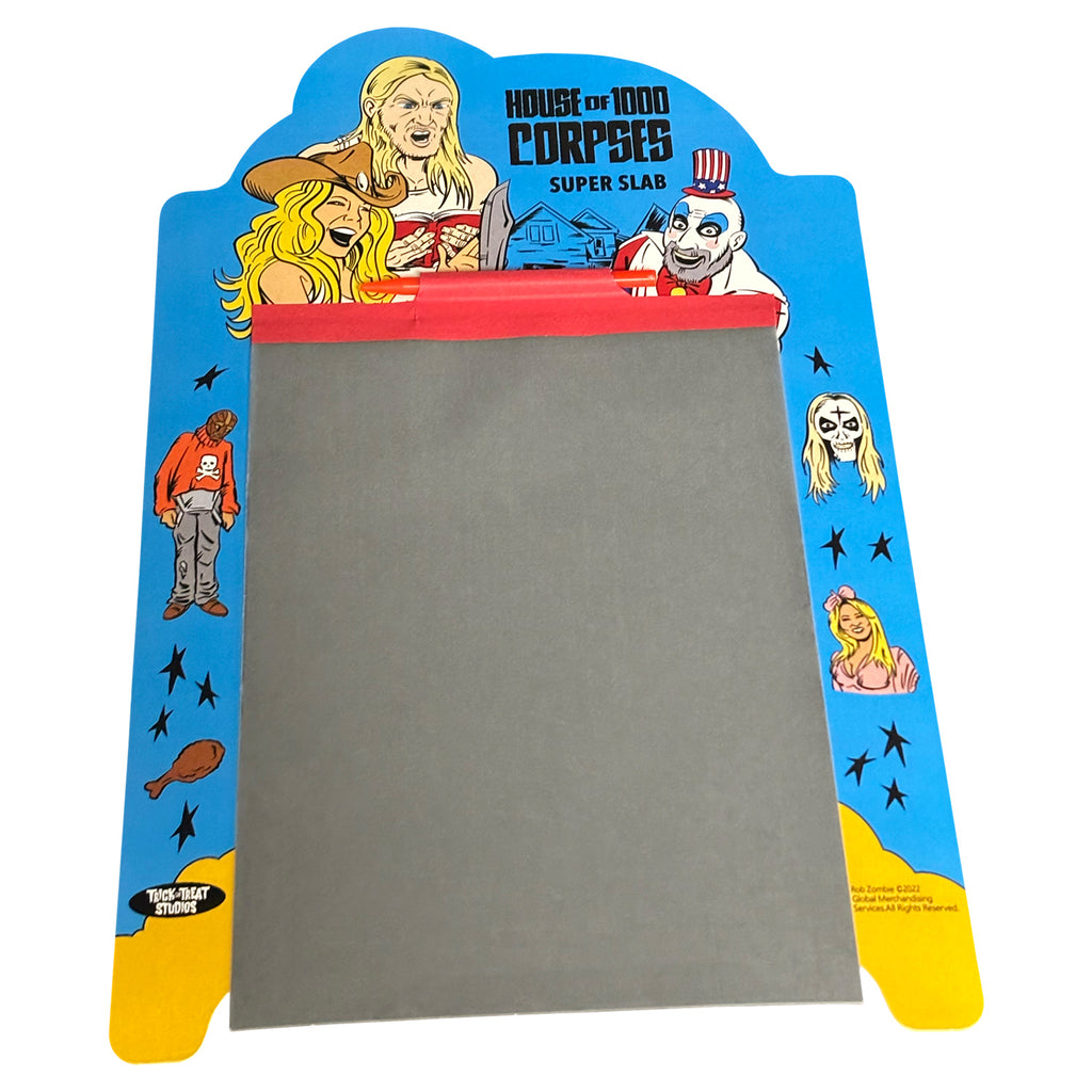 reusable doodle pad. blue, red and yellow with illustrations of movie characters. Black text reads House of 1000 Corpses, super slab, manufacturing and licensing information. Black oval with white text reads Trick or Treat Studios.