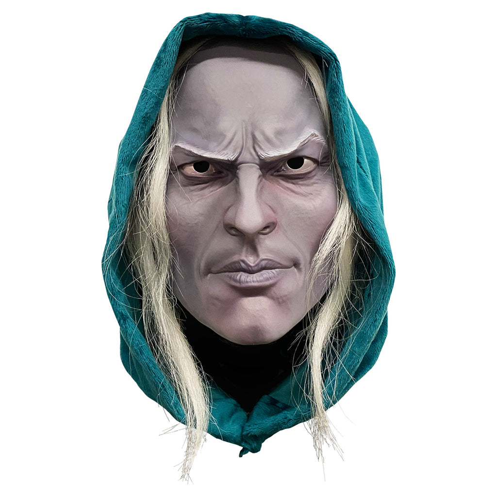 Plastic face mask, front view.  Man's face, wearing green-blue hood, long light blond hair, pale skin, furrowed brow, strong nose, cheeks and jaw, mouth close.