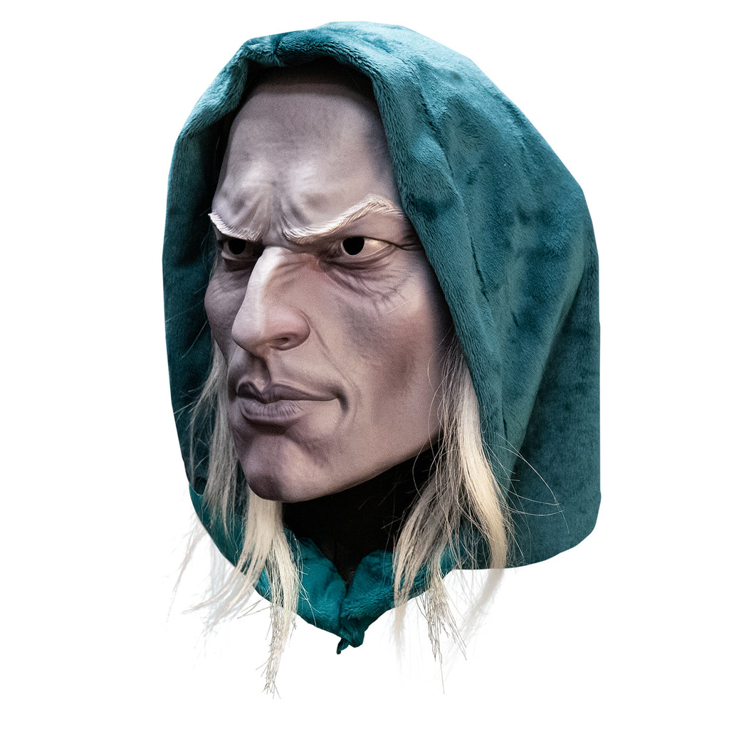 Plastic face mask, left view. Man's face, wearing green-blue hood, long light blond hair, pale skin, furrowed brow, strong nose, cheeks and jaw, mouth closed.