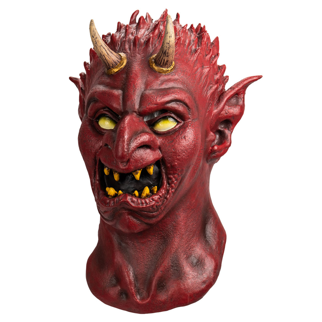 Mask, slight left view, head and neck. Red flesh, small red spikes on head like hair, two tan horns at top of forehead, no eyebrows, pointed ears, yellow eyes, large pointed nose, mouth open in a sneer, sharp yellow teeth.