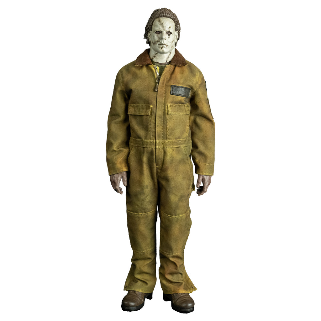 Front view, Michael Myers 1:6 scale action figure. Wearing Halloween 2007 mask, tan coveralls, brown boots. hands at sides