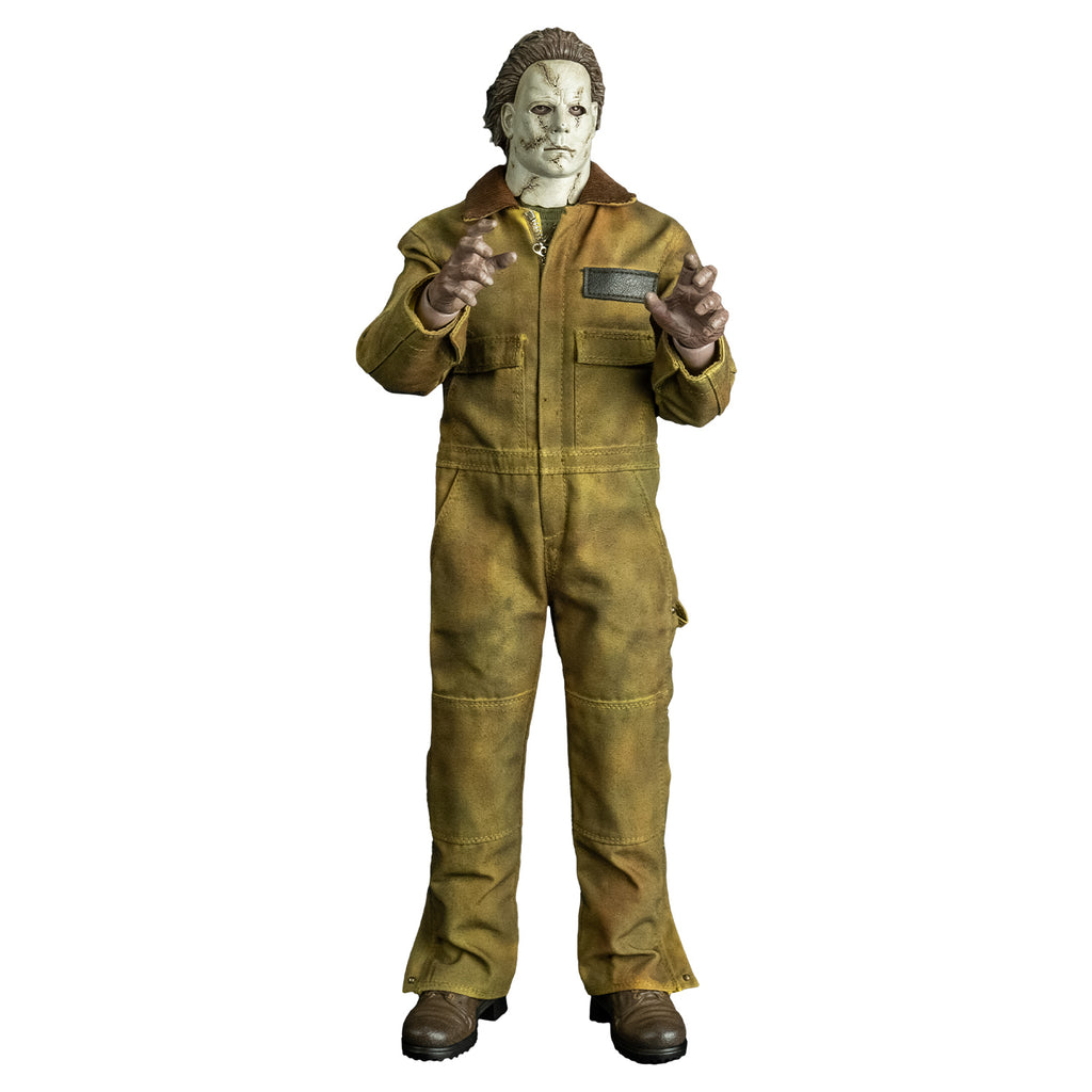 Front view, Michael Myers 1:6 scale action figure. Wearing Halloween 2007 mask, tan coveralls, brown boots. Hands raised above waist in grabbing position.