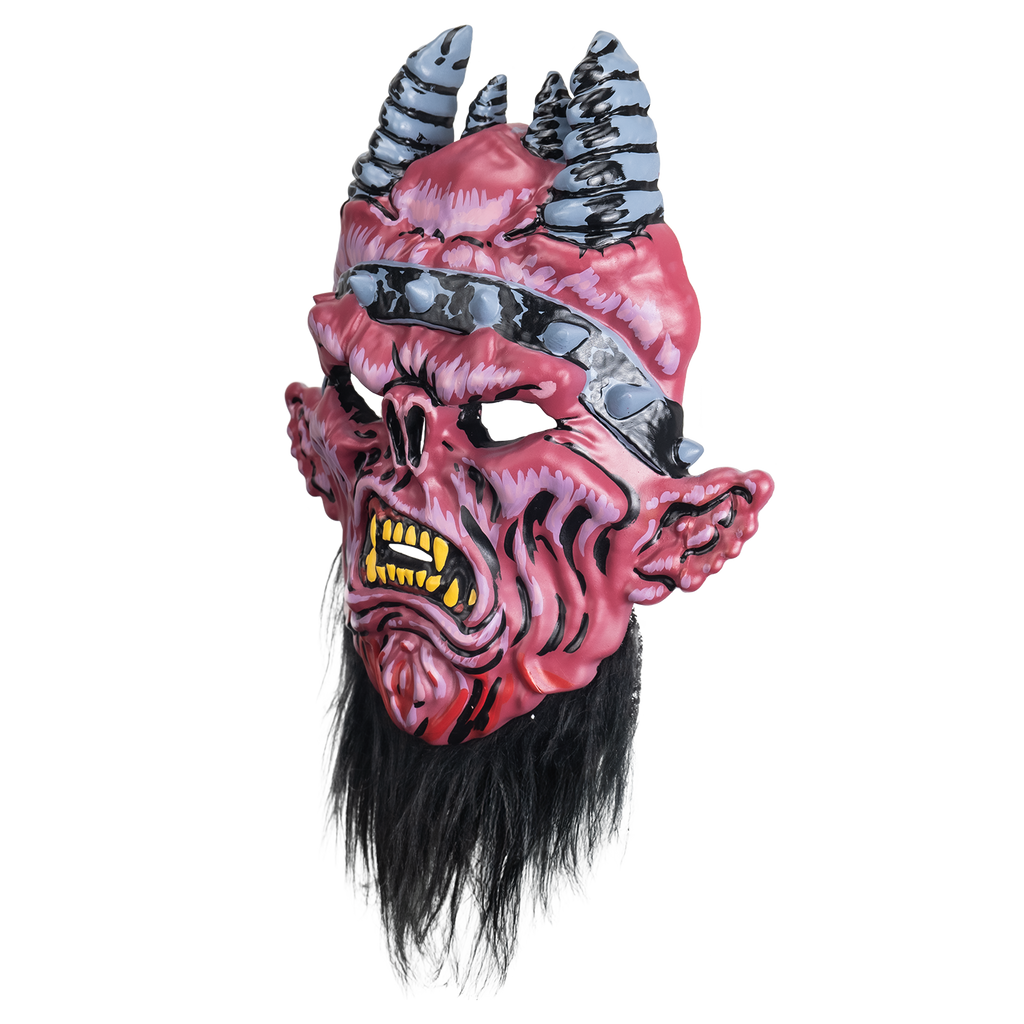 Mask, left view.  Red and pink demon-like face, wrinkled flesh.  4 gray and black horns on head.  black headband with silver spikes.  furrowed brow, snout-like nose, large pointed ears.  mouth open in a snarl, large yellow teeth and fangs.  black beard below chin
