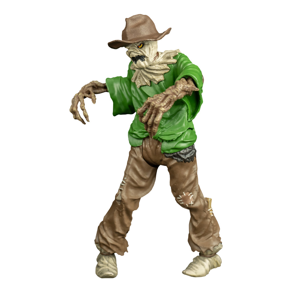 goosebumps scarecrow figure, left view.  Wearing a brown hat, burlap over head and neck, yellow eyes, jagged black mouth. Green shirt, light brown patched pants, cloth shoes tied around ankles.  Skeletal tan arms with long fingers and sharp claws.