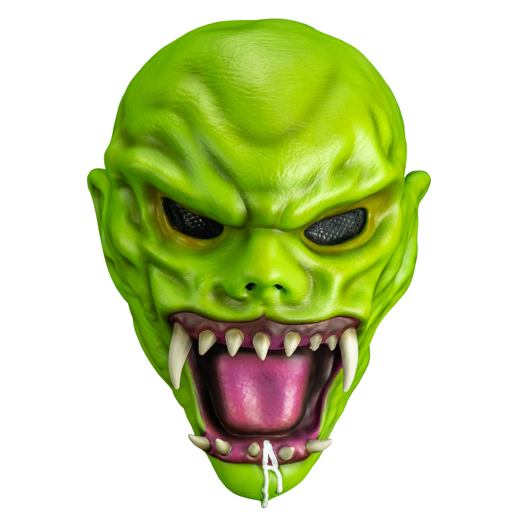 front view. Bright green skin, no hair. Angry face with large ears, black eyes, large snarling mouth with sharp white teeth, pink tongue and gums.  white drool on bottom jaw and chin.