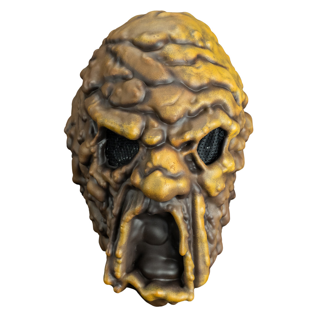 Mask front view.  Brown mud-like flesh that appears to be dripping down the face especially around the mouth.