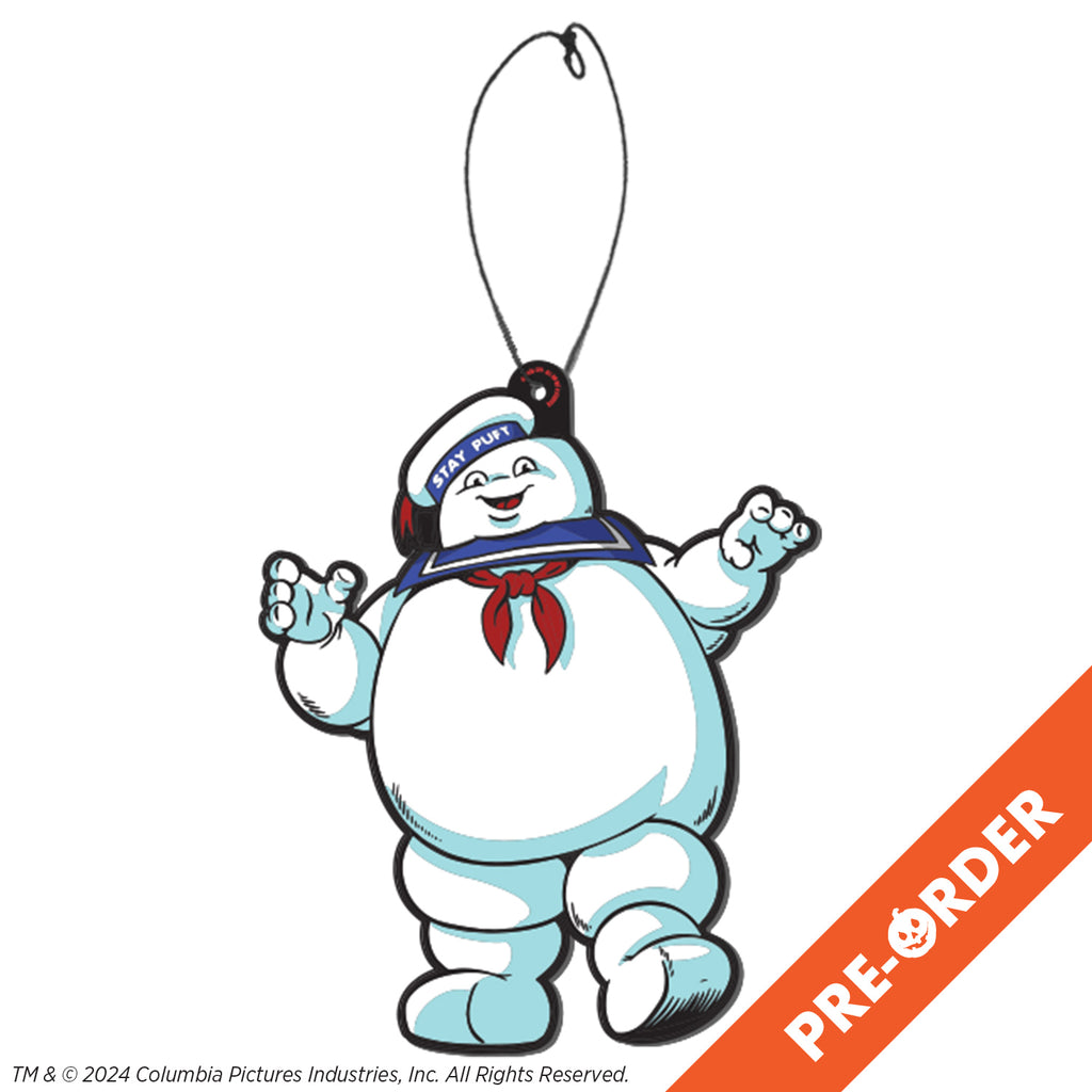 White background, orange diagonal banner at bottom right, white text reads pre-order. Fear Freshener. Round white head, large eyes with large black pupils, mouth open in a smile showing red tongue. White hat cocked to the side on the right side of the head, blue band with white text reads Stay Puft, red ribbon tassel at top center of hat. Blue sailor collar, red neckerchief. Plump round body, legs, and arms.
