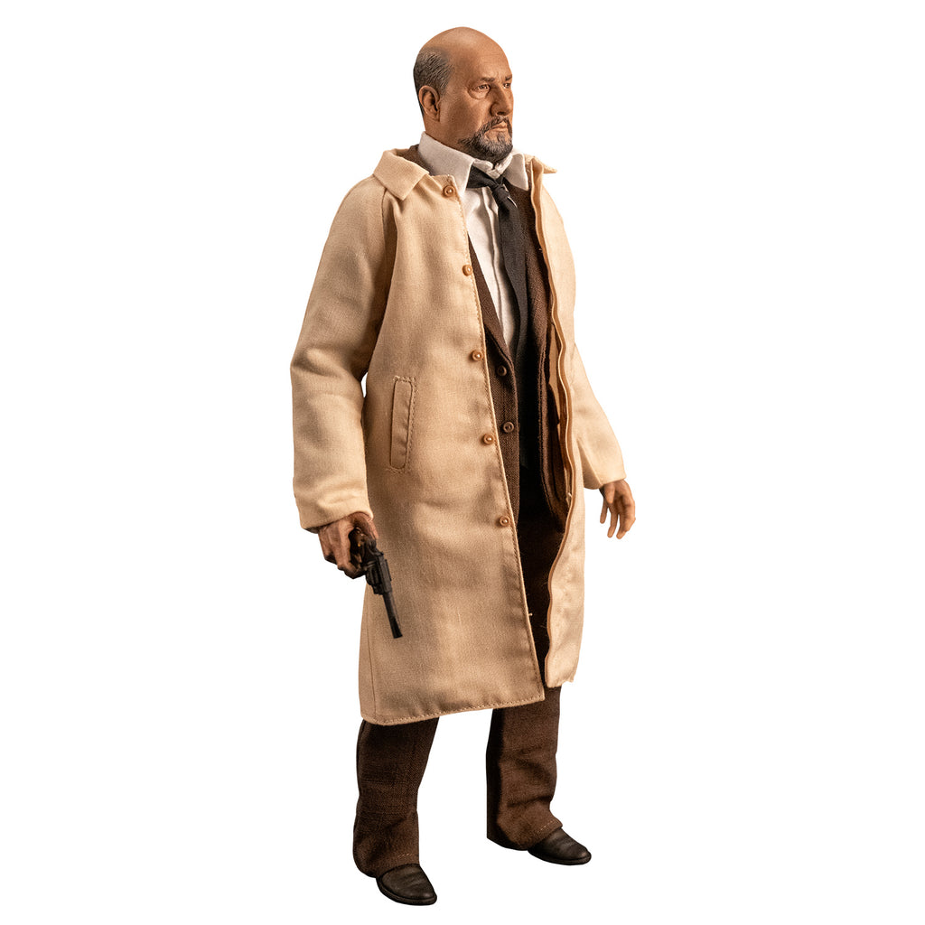 White background. Slight right full view of Dr. Loomis figure. Bald man with beard and mustache. white shirt, black tie, brown suit coat and pants, tan trench coat, black shoes. Holding black pistol in right hand pointed at the ground.