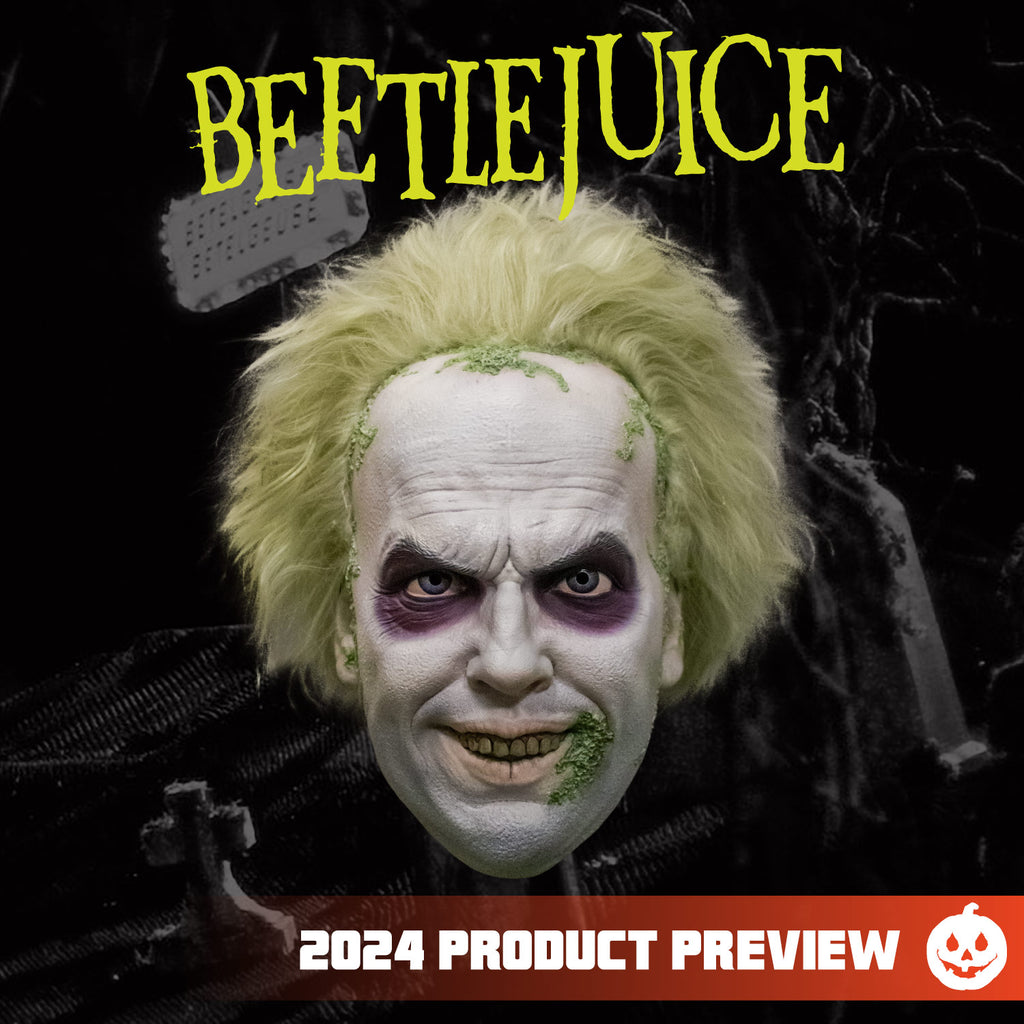 Beetlejuice plastic mask. black and white graveyard scene background. Blond messy hair with green tints.  White skin, green moss around edges of the hairline and left corner of mouth.  Purple circles around blue eyes.  Mouth slightly open in a grin.  Yellow text reads Beetlejuice. orange horizontal banner at bottom, white text reads 2024 product preview, white jack o' lantern.