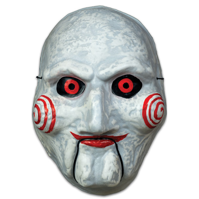 Plastic vacuform mask. Billy Puppet, white face, black-rimmed red eyes, red spirals on cheeks, red lips on hinged ventriloquist dummy mouth.