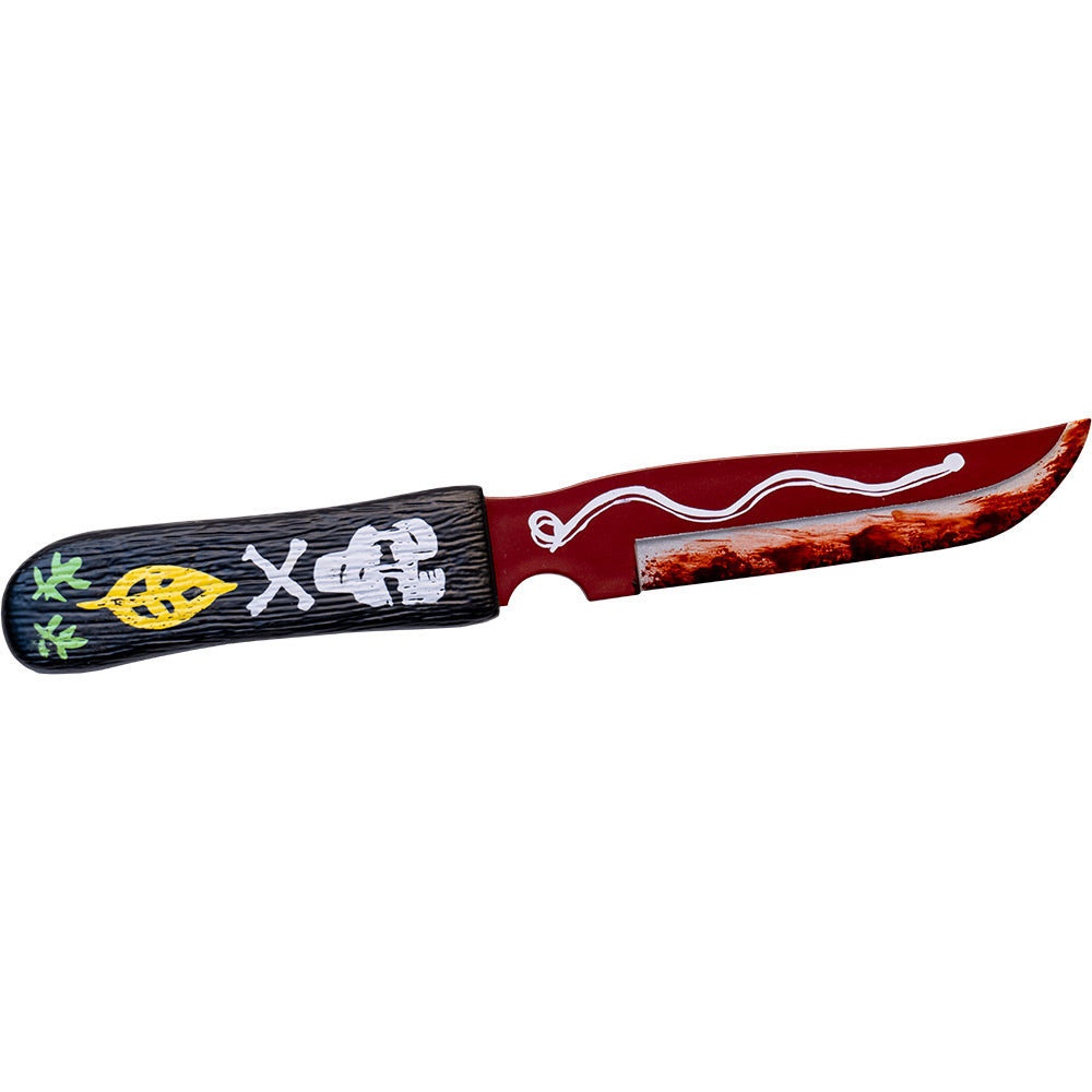 Prop.  Ultimate Chucky voodoo knife. Black handle with skull and crossbones, yellow leaf, green leaves.  Red blade with white embellishment, bloodstained blade. 
