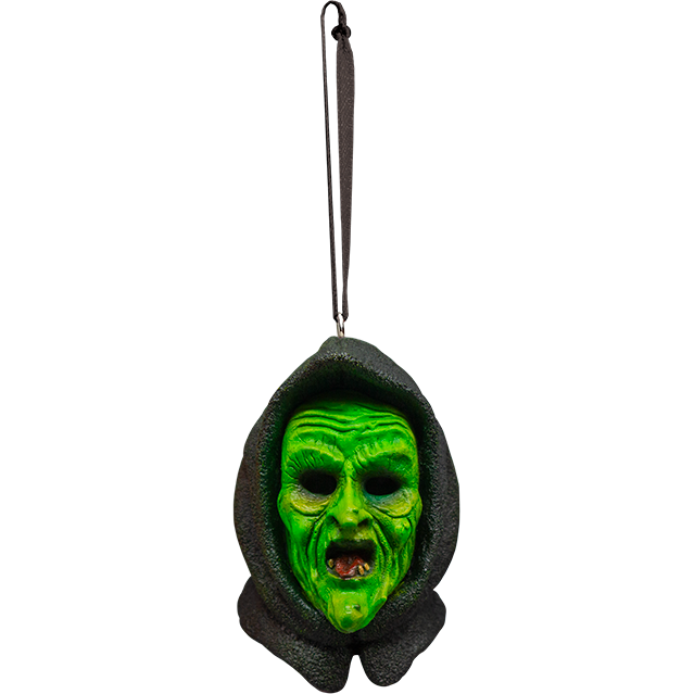 Ornament. Green witch face wearing dark hood.