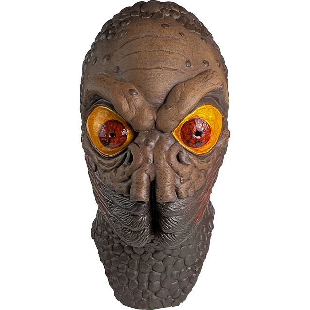 Mask, head and neck, front view.  Brown, wrinkled and bumpy skin. Heavy brows large red and yellow eyes, two large nostrils under eyes, insect-like mouth.