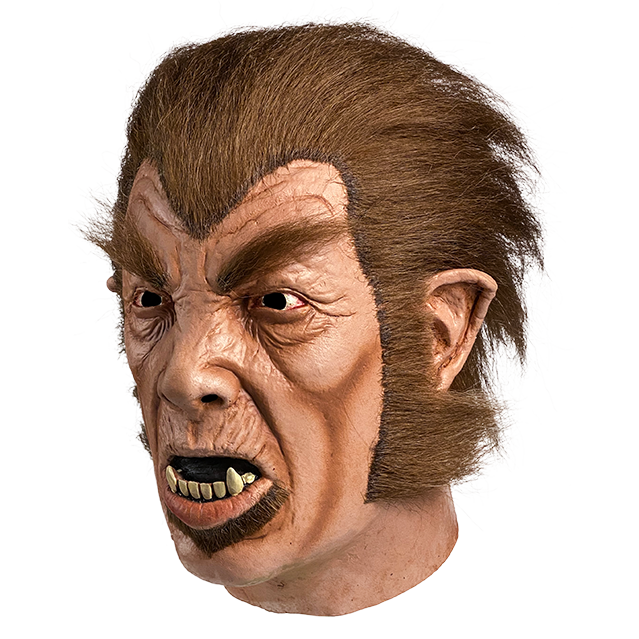Mask, head and neck, left view. Wrinkled skin around forehead, eyes and lips. Red brown fur on head, sides of face and under bottom lip, Bushy brown eyebrows. Pointed ears. Mouth open showing lower teeth and fangs.