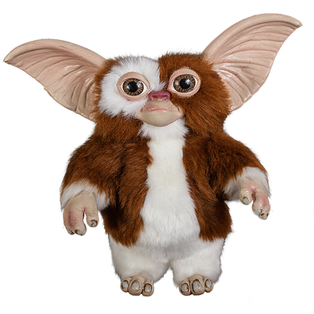 Gizmo puppet prop, full body, brown and white fur large brown eyes, large pointed tan ears.