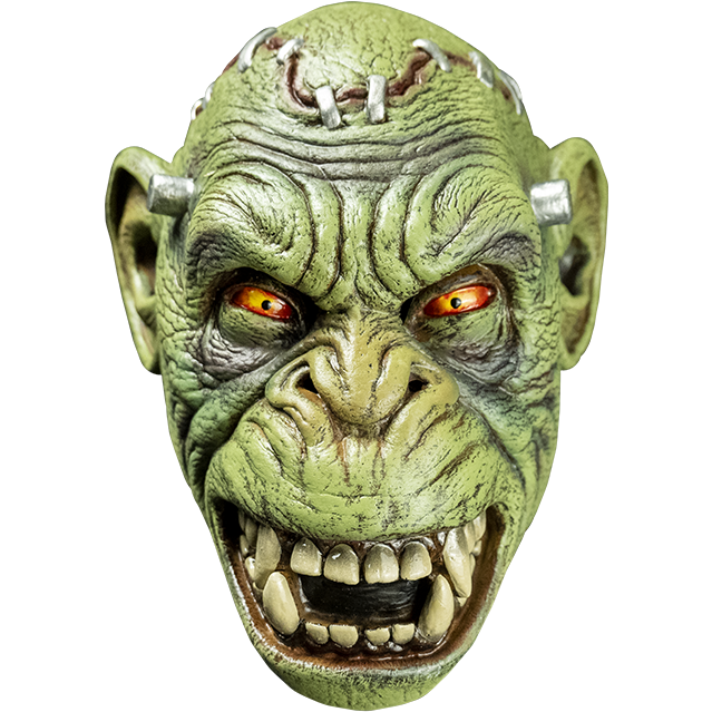 Mask, front view.  Lab chimp, Green flesh, metal staples in scalp, metal posts at temples.  Yellow and red eyes, small pupils, scowling open mouth showing teeth.