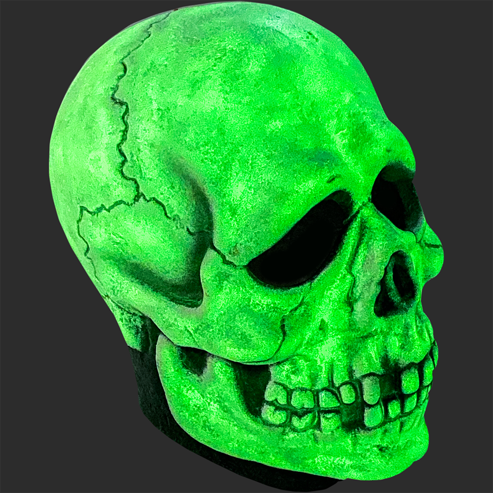 Mask, right side view. Glow in the dark feature, bright green skull face. black neck.