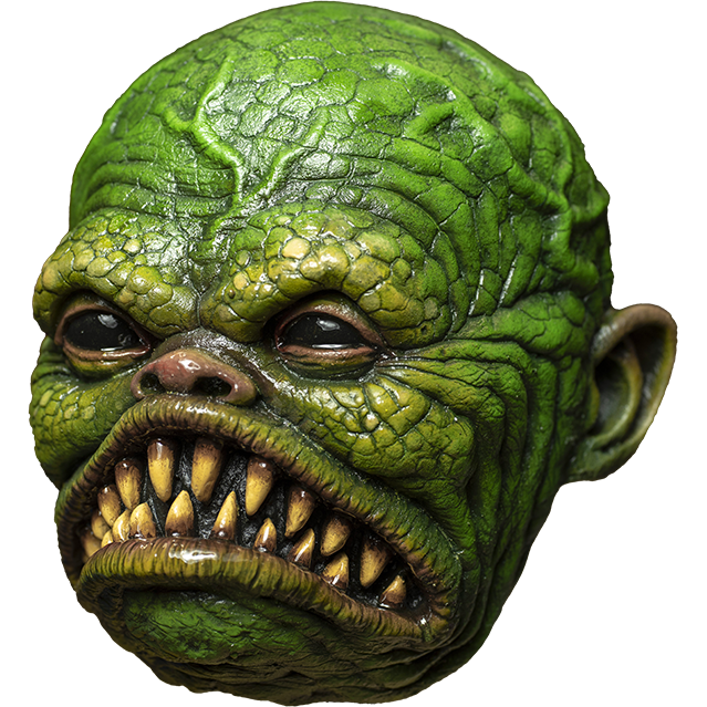 Mask, left side view. Green scaly face, bulging veins, black shiny eyes, small snub nose. Large frowning fish mouth with large sharp yellowed teeth.