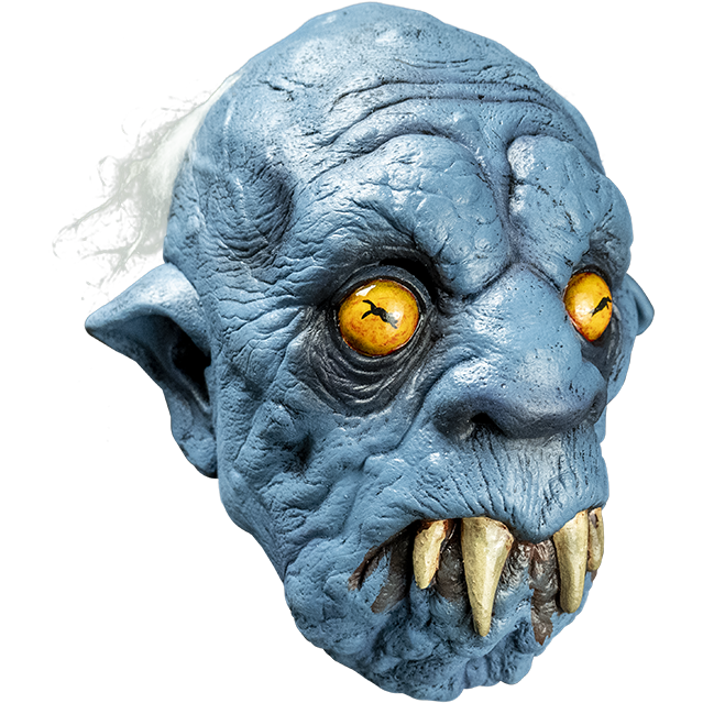 Mask, right view. Creature, mostly bald, wispy white hair on back of head. Wrinkled blue skin. Yellow eyes, pointed ears, large nose. Downturned mouth with 4 large fangs protruding, brown drool.