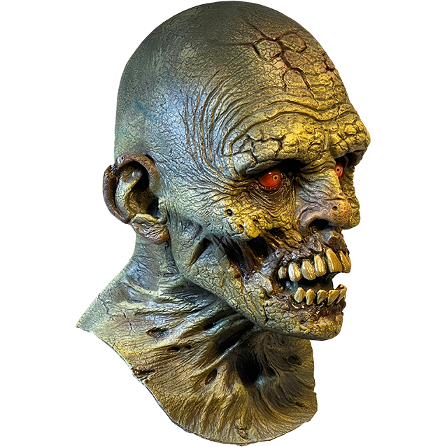 Mask, head and neck, right side view. Bald head, dry cracked skin, red-orange eyes, missing lips showing large, yellowed teeth.