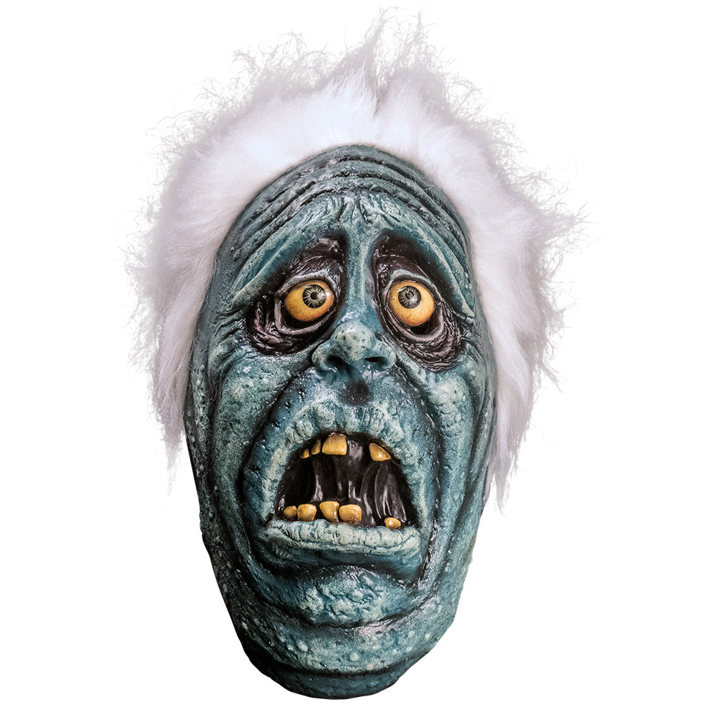 Mask Front view.  Scared blue face with wrinkled sagging skin, Black circles around yellow eyes with blue irises.  Open mouth with crooked yellow teeth. Bright white fluffy hair.