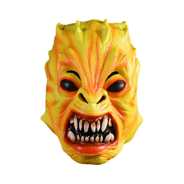 Mask. Reptile like creature.  Bright yellow and orange skin, spikes on head.  Solid black eyes. Snout with flared nostrils.  Large snarling mouth with sharp teeth.