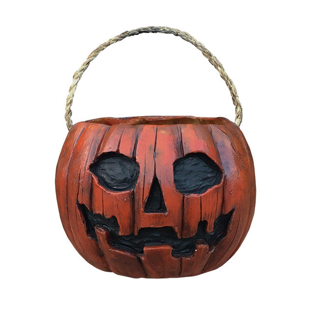 Orange and black  Jack O' Lantern pumpkin candy pail, with white rope handle.