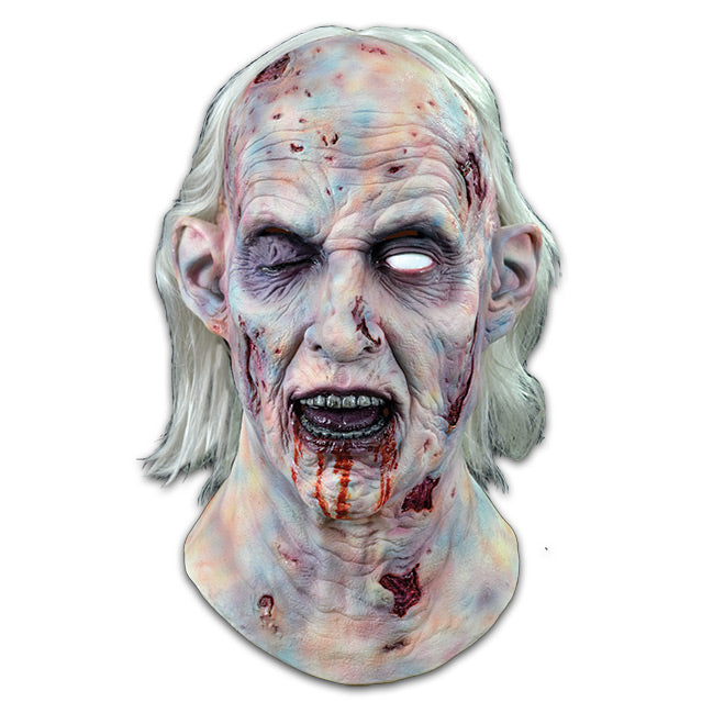 Mask, head and neck. Long white hair.  Old woman's face, discolored, with wrinkles and sores. Right eye is blackened and shut, left eye is white.  Mouth slightly open with blackened teeth, blood dripping down chin.