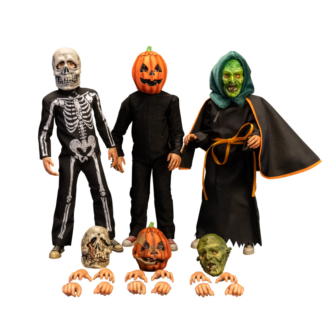 Three 1/6 scale figures and accessories.  Figure in skeleton costume, figure in jack o' lantern costume, figure in witch costume.  additional spooky rotting heads and additional hands