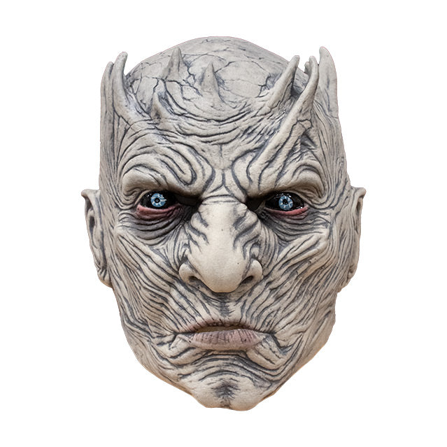 Front view. Night King Mask. Bald head, extremely wrinkled light gray skin, spikes around crown of head.  Bright blue red-rimmed eyes on black where the whites should be.