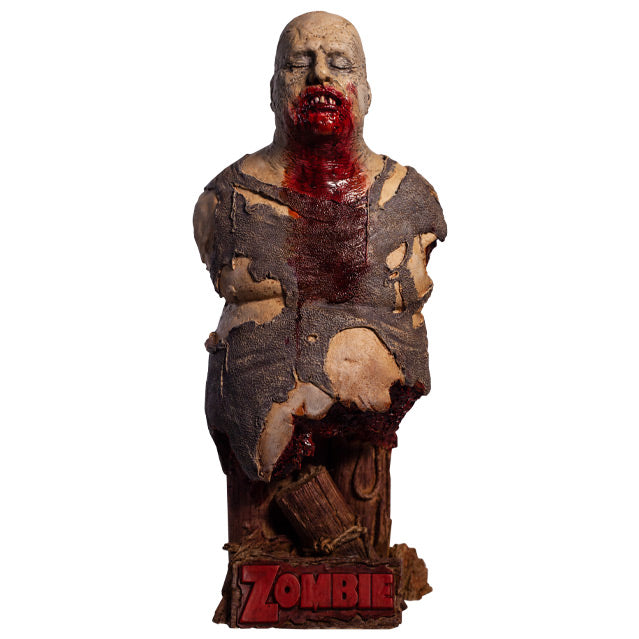 Bust front view.  Zombie, head and torso torn shirt, pot belly.  Bald head, eyes closed, gory mouth blood from mouth running down chest.  Base is wooden pier posts and rope.  Plaque at bottom red text reads Zombie