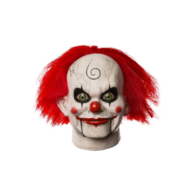 Mary Shaw Clown Mask, head and neck. Distressed finish white skin, ventriloquist dummy clown face, spiral curl drawn on forehead, rosy red spots on cheeks, red nose, bright red hair, black-rimmed, bloodshot green eyes. Bright red grinning lips,  hinged  lower jaw.