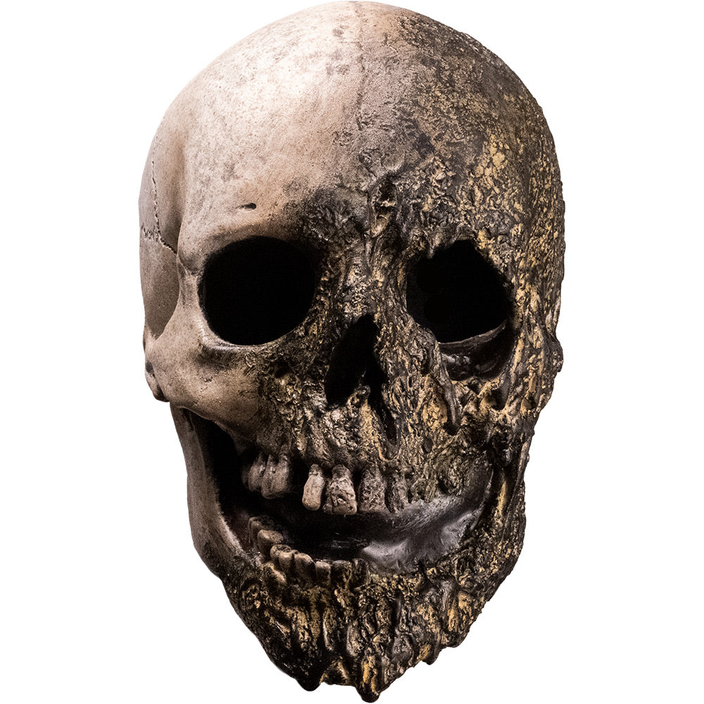 Mask, front view.  Skull mask, Left side of skull appears burnt.