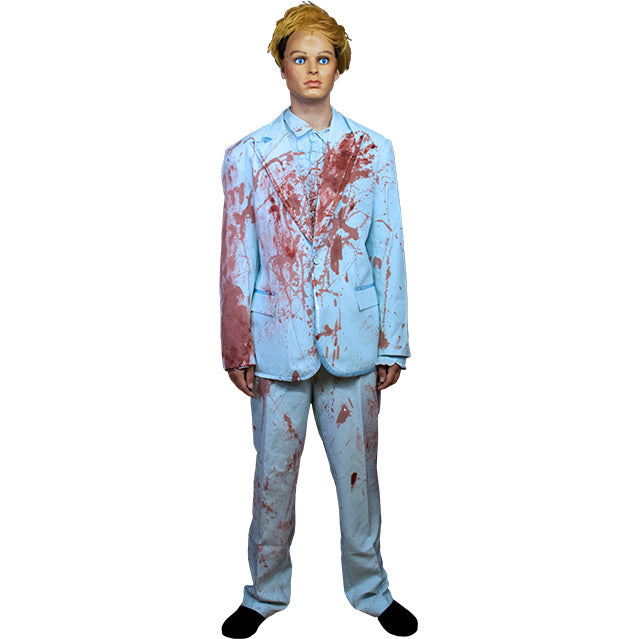 Man in blue suit and pants, smeared with blood.  wearing short blond wig and blue eyed  Pretty Boy Mask.  Black shoes.