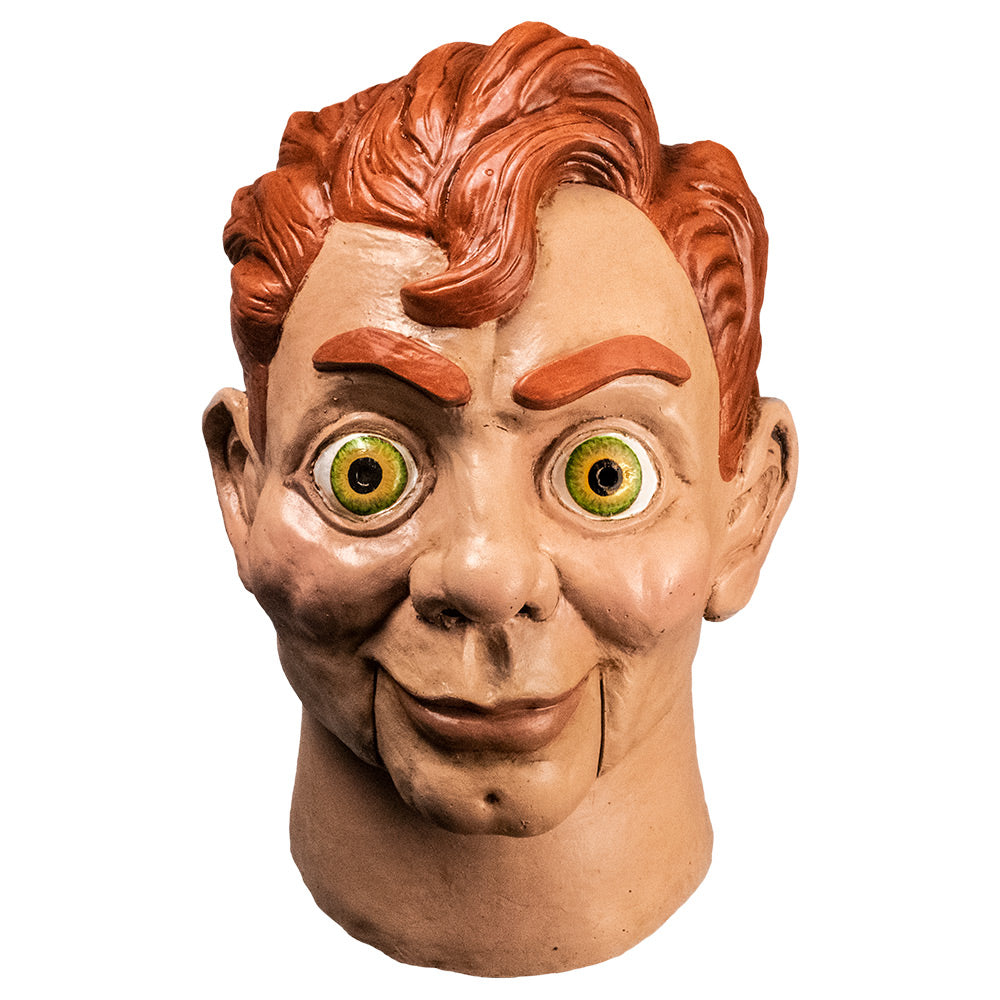 Ventriloquist dummy mask front view.  Head and neck.  Red hair and eyebrows, large yellow green eyes